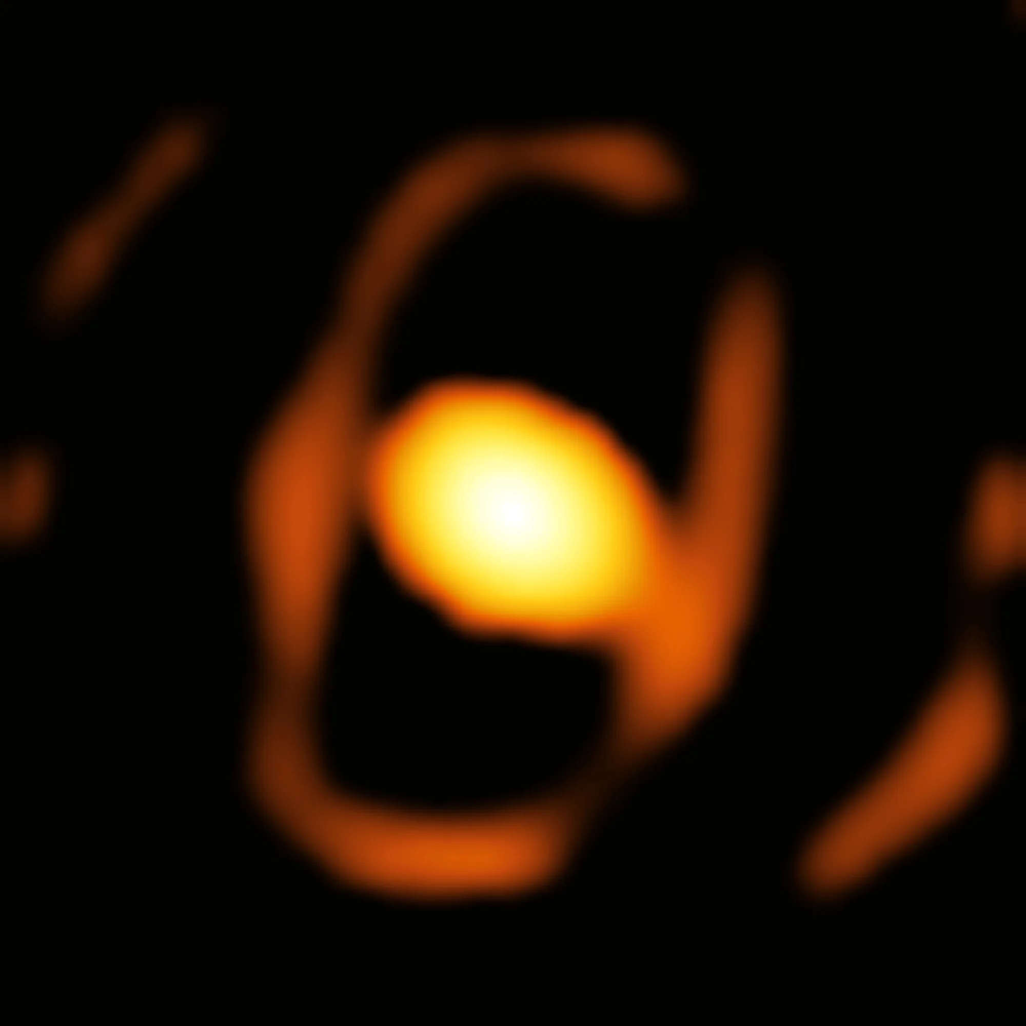 Una envoltura ovalada y brillante de polvo rodea la estrella WOH G64 sobre un fondo oscuro.